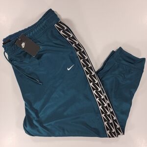 Nike Sportswear Women's Teal Tape Logo Jogger Pants (CQ6311-347) 3X Performance